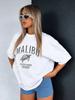 T-shirt oversize z nadrukiem Y2K (Malibu)