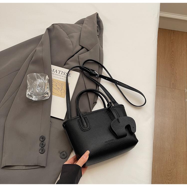 Fashion Retro Bucket Bag Women's Korean Version of Simple Casual Shoulder Bag 2025 New Niche Design Portable Messenger Bag