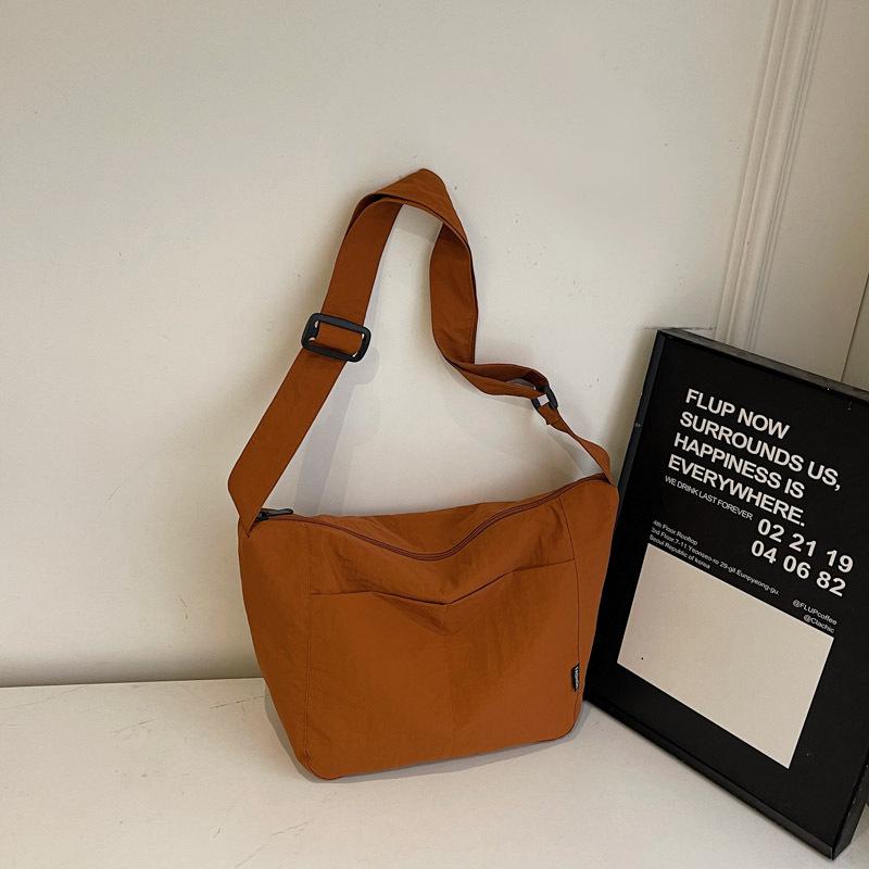 Japanese casual niche design crossbody bag one-shoulder summer cloth bag women's 2025 simple retro commuter tote bag