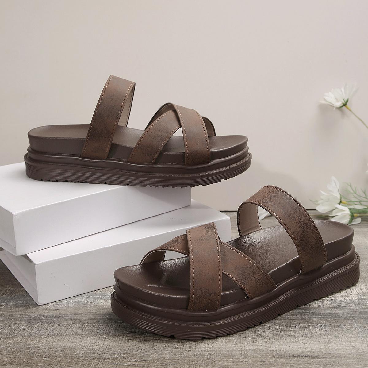 

2024 новые импортные торговые тапочки на платформе женские туфли большого размера однотонные повседневные туфли на платформе с плоским дном с крестом женские 43 темно-коричневого