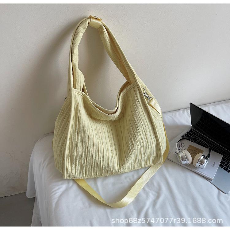 

Korean canvas bag women s 2025 new simple literary and large-capacity commuter messenger bag casual fashion shoulder bag жёлтый