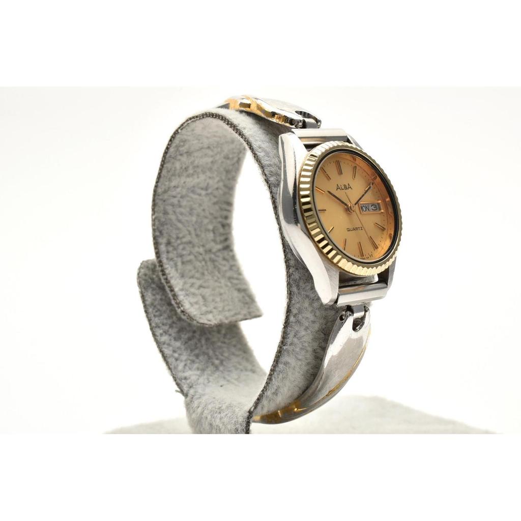 Used Good Condition SEIKO Alba V248-0100 Quartz Day Date Gold Dial Stainless Steel x Gold Color 1990's Ladies Watch Working Item