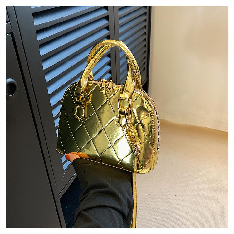 

2024 новий тренд ретро текстура сумка черепашка іноземний стиль суцільний простий модний лакована шкіра глянцева сумка через плече золотий