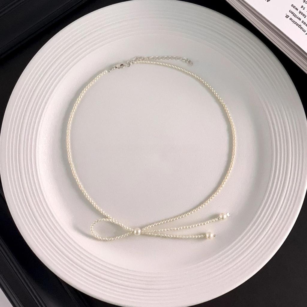 Super fairy bow pearl necklace fashion design collarbone chain colored stone light luxury Internet celebrity accessories neck chain