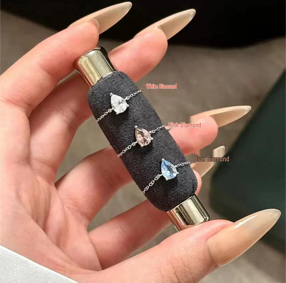 

Кольцо из стерлингового серебра 925 пробы с цирконом в форме капли, с дизайном в холодных тонах, изысканной цепочкой и регулируемой посадкой. Adjustable