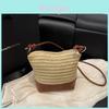 Borsa a secchiello intrecciata in paglia con chiusura a zip per uso casual diurno