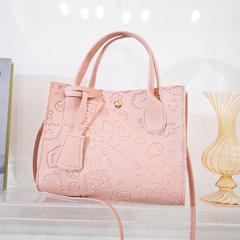 

Spring new tote bag shoulder bag Korean street trend version bag women s embossed handbag one piece розовый
