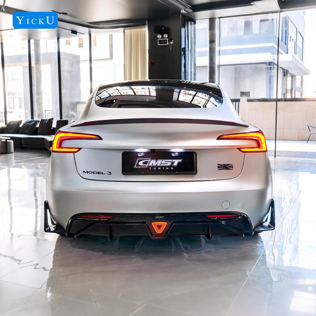 Upgrade your Tesla Model 3 P with CMST carbon fiber front lip with lights, rear lip, air intakes, and side skirts.