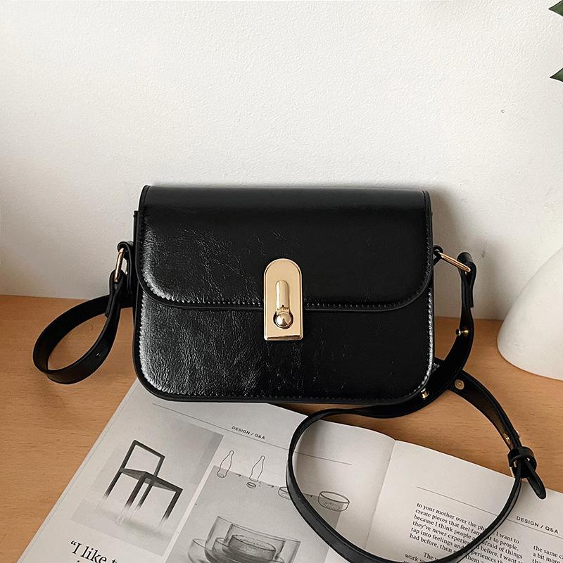 

Премиальный сенс простой портативный маленький квадратный мешок женский 2025 новый осенне-зимний модный легкий роскошный универсальный деловой наплечный мессенджер чёрный