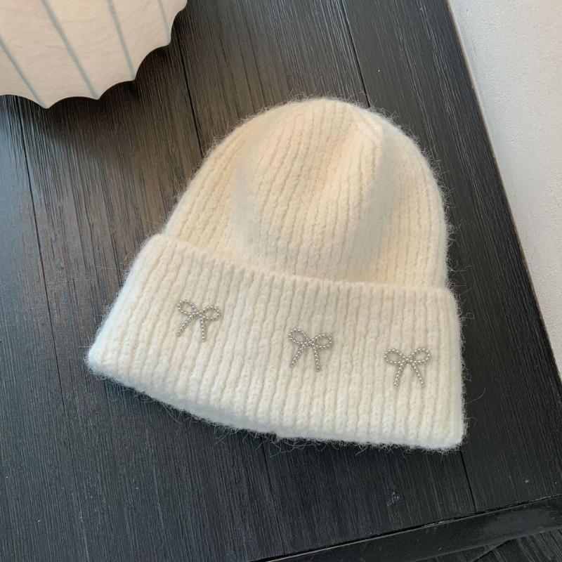

Bow knitted wool hat autumn and winter new big head circumference versatile fashion ear protector cold hat women белый