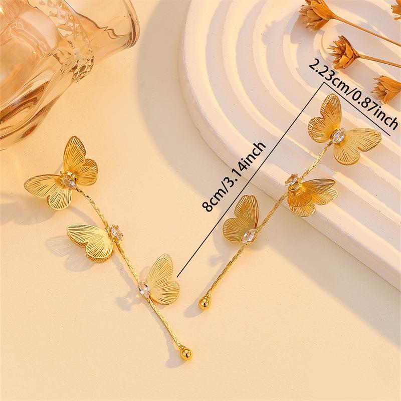 Long-flowing Tassel Butterfly Earrings for Women - Luxurious and High-end Ear Studs with Unique, Exaggerated and Grand Design.