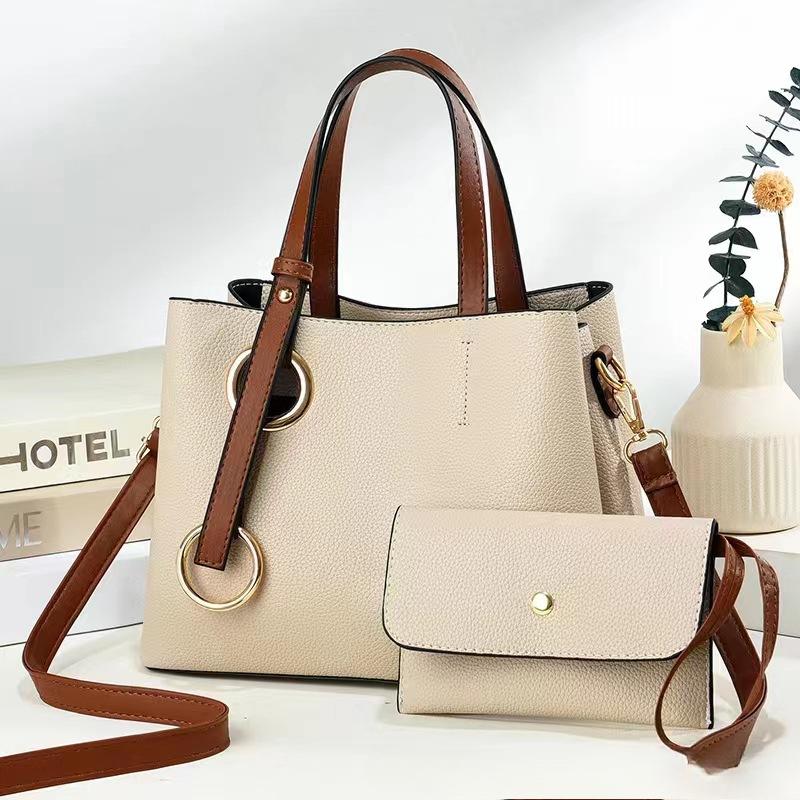 

Сумка для поездок на работу Женская сумка для писем Новая большая вместимость Простая все атмосфера Сумка для мам среднего возраста .