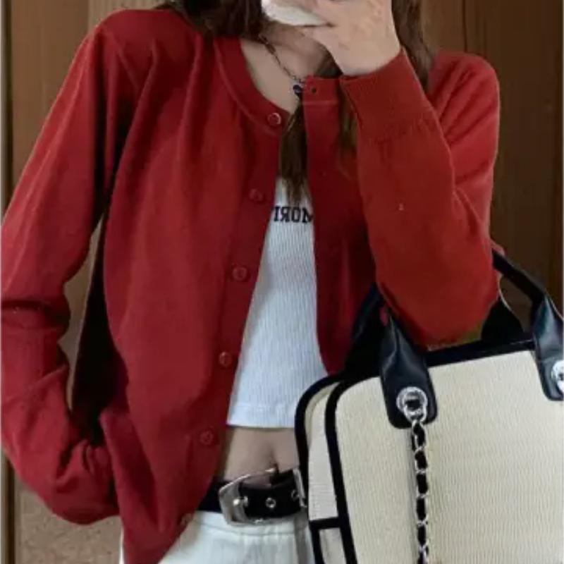 A New Style of Women's Knitted Cardigan Sweater Coat Paired with A Loose Top