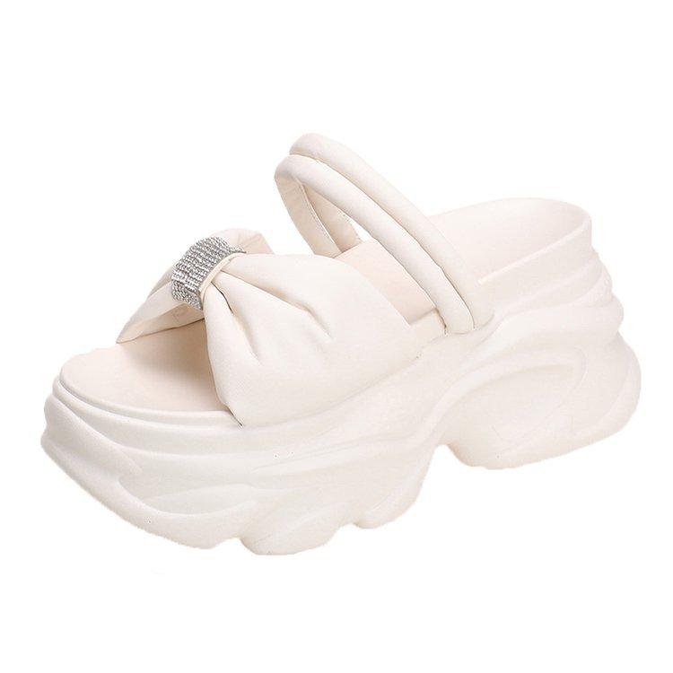 

Fairy wind bow two wear cool slippers 2025 summer new rhinestone thick-bottomed muffin heightened slope heel one-word drag 39 абрикосовый