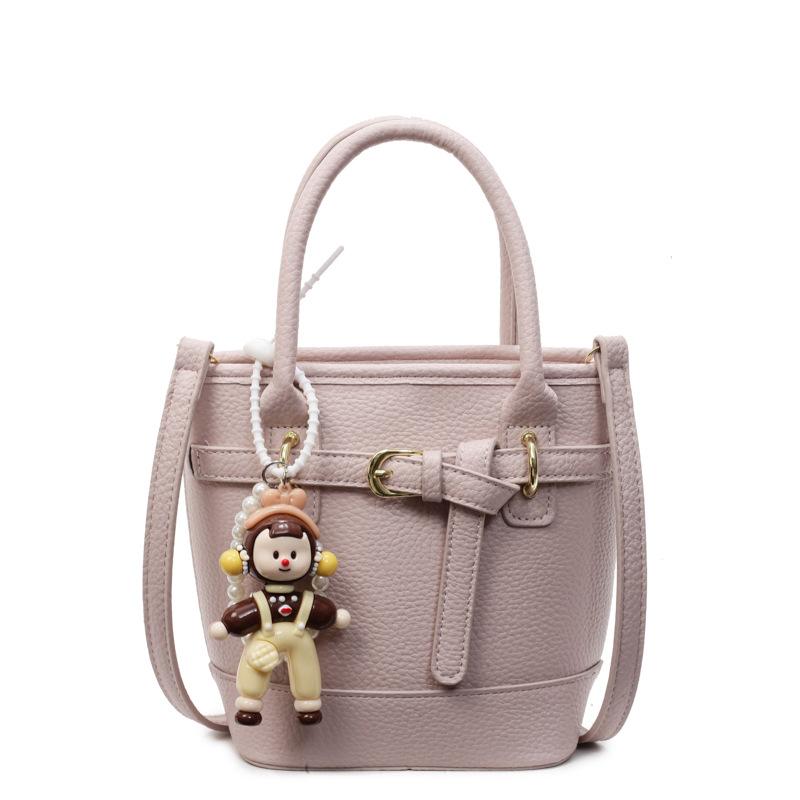 Hot sale in spring and summer Korean simple lychee pattern texture portable bucket bag casual commuting versatile solid color messenger women's bag