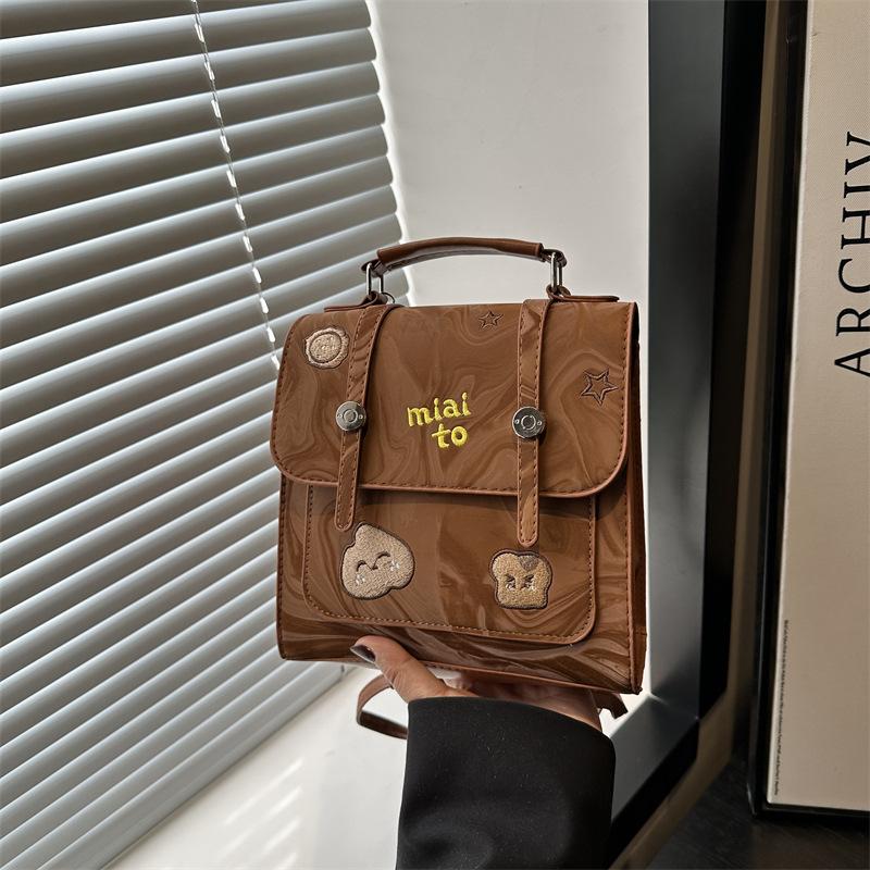 

2025 new Korean version trendy retro handbag fashion ins casual versatile niche texture women s backpack коричневый