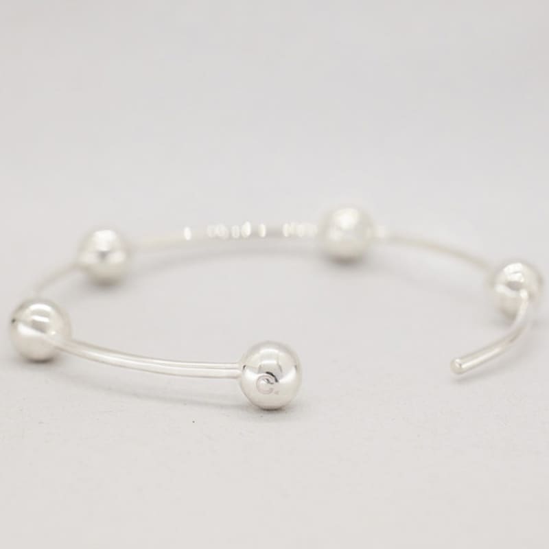 COLLECT SYNERGY quinetet ball cuff bracelet