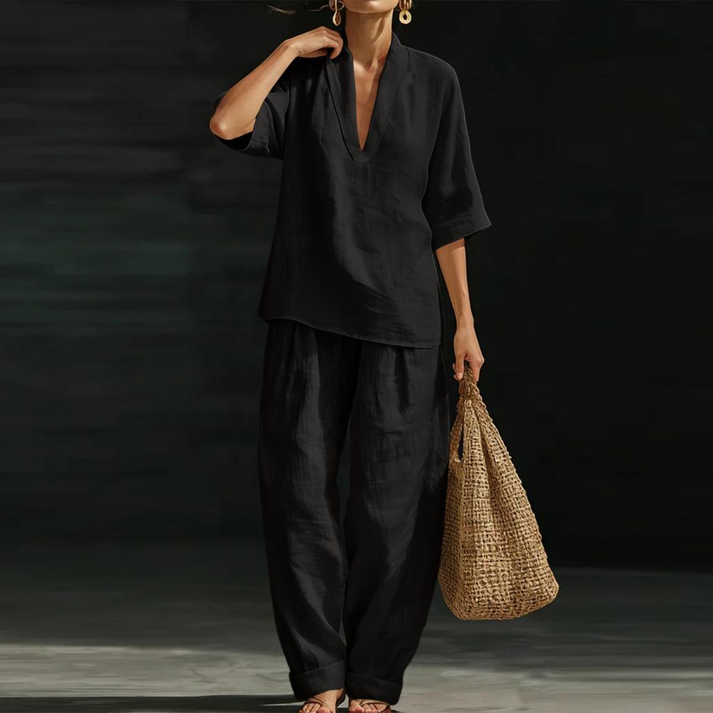 Damset med V-ringad pullovertopp och lös midja, avslappnad