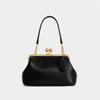 Hot sale European beautiful women bag light luxury retro fashion clip bag versatile shoulder bag metal frame handbag women