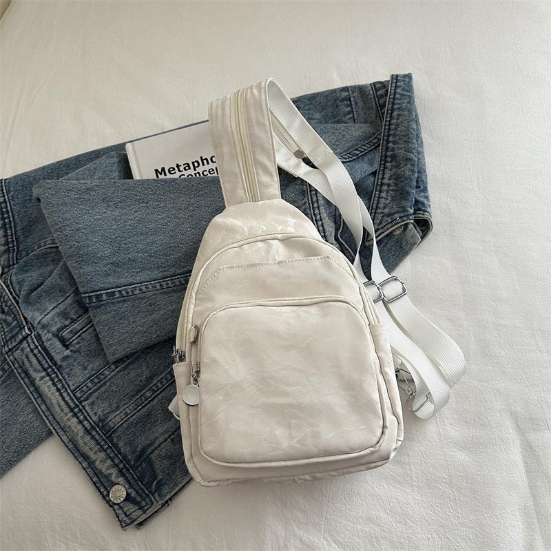 

2025 autumn new foreign style personalized sports lightweight breast bag fashionable simple and beautiful casual shoulder messenger women s bag