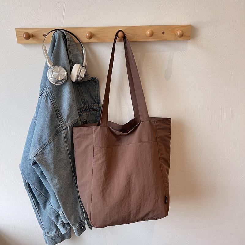 

Литературная и повседневная тканевая сумка женская новая простая и универсальная сумка через плечо нишевая сумка-тоут для поездок на работу