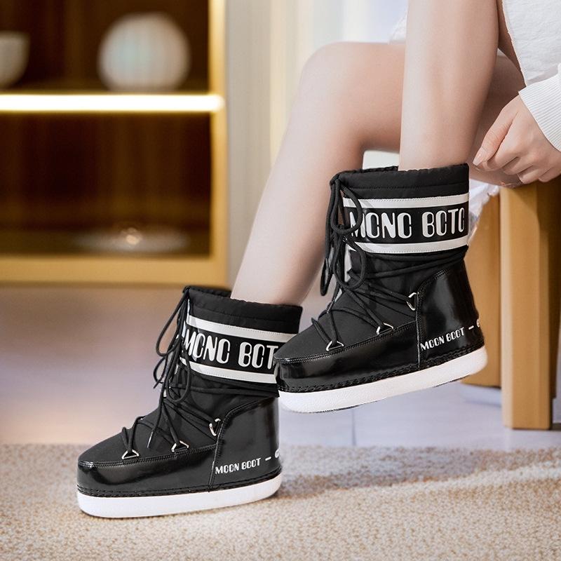 

Размер 33 женские ботинки 2025 теплые новые лыжные зимние лунные утолщенные средней длины водонепроницаемые и нескользящие снежные космические 38 чёрный