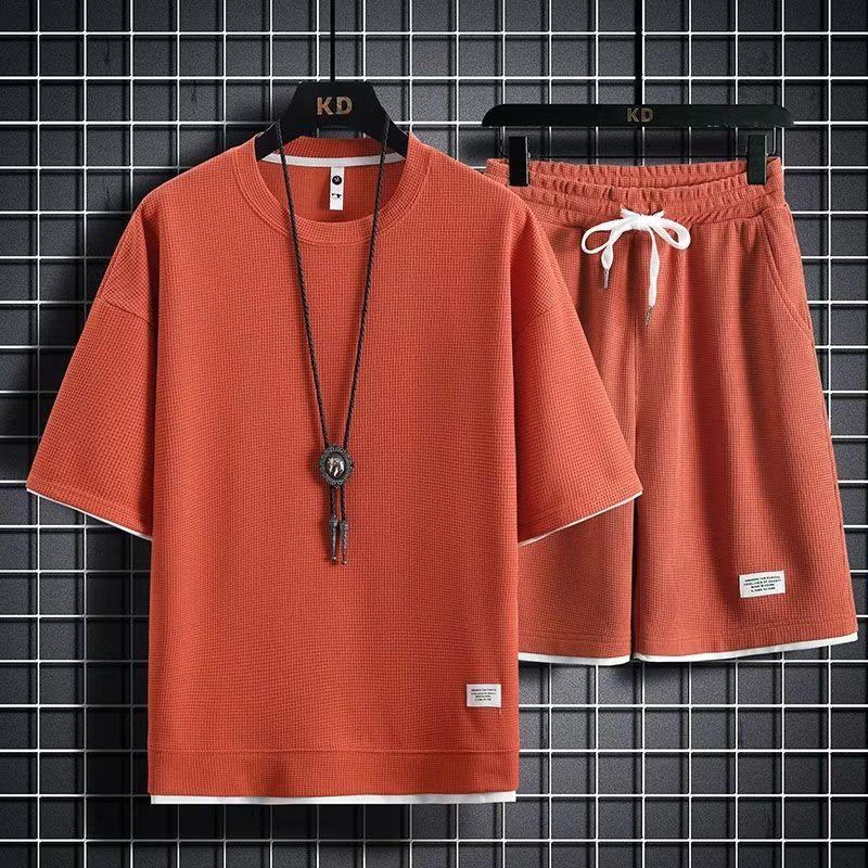 

Мужской летний спортивный комплект из вафельной вязки: Модные свободные шорты и топ с короткими рукавами XL (60-65 kg)