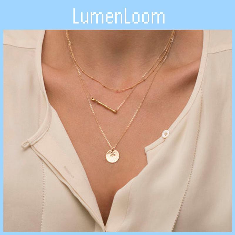 Elegant Multi-layered Gold Necklace Featuring Unique Geometric Shapes For Fashion Lovers