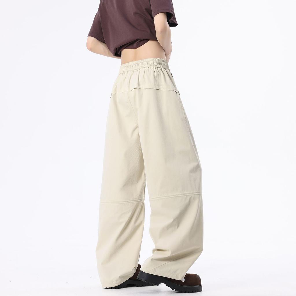 Spring and summer new European and American retro splicing light apricot scimitar loose straight casual pants men's trendy pants