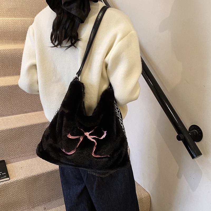 Casual fluffy bag large capacity tote bag bow women's shoulder underarm bag autumn and winter new backpack plush bag