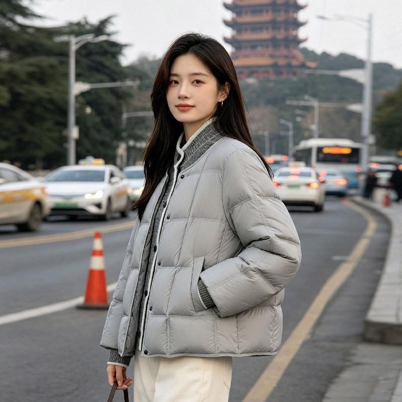 Down Jacket Women's Pinghu New Knitted Splicing Fake Two-piece Stand-up Collar Duck Down Fashion Coat