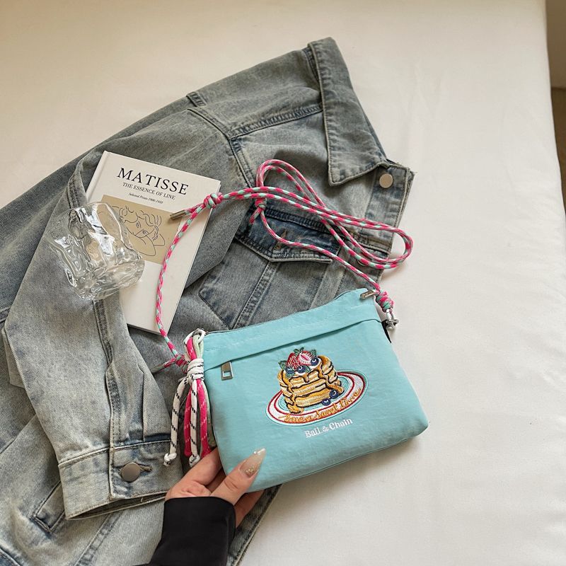 

Summer Niche Style Nylon Canvas Commuter Bag Women s 2025 New Arrival Cute Embroider Zipper Crossbody Phone Bag Blue
