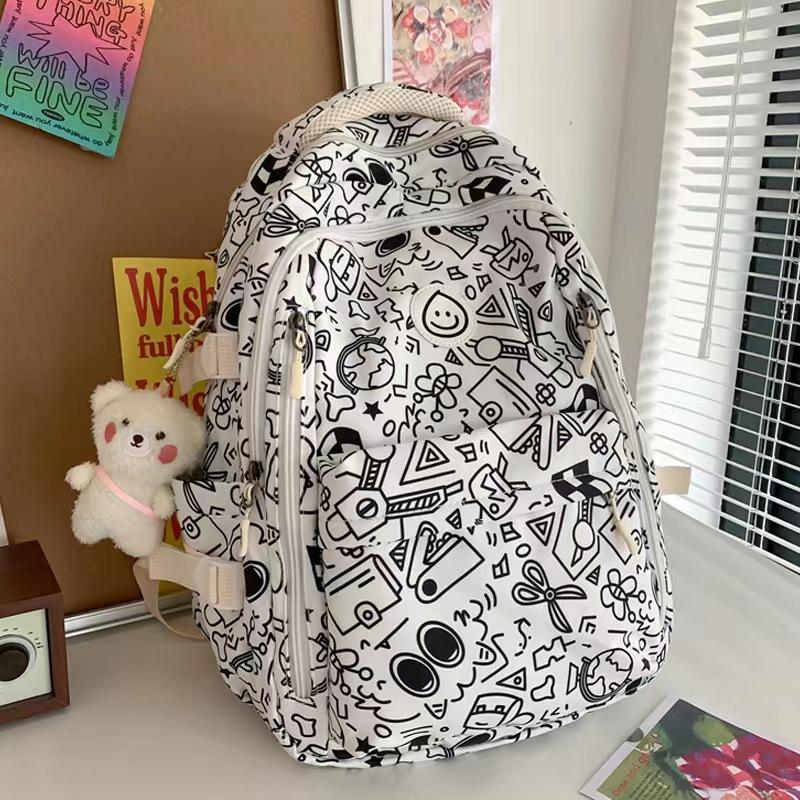 Schoolbag Japanese school bag female ins niche Harajuku graffiti design backpack junior high school college student large capacity backpack female