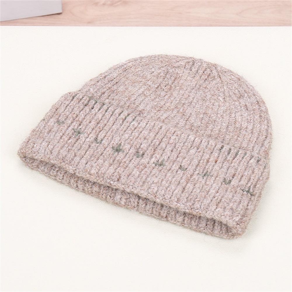 Autumn and winter simple small line knitted hat women's autumn and winter warm wool hat showing face small cold hat men and women
