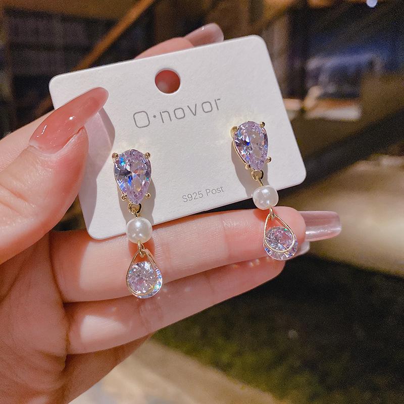 

Вишукані літні сережки-квіти з фіолетовими кристалами: Трендові, у формі серця, універсальні сережки-пусети