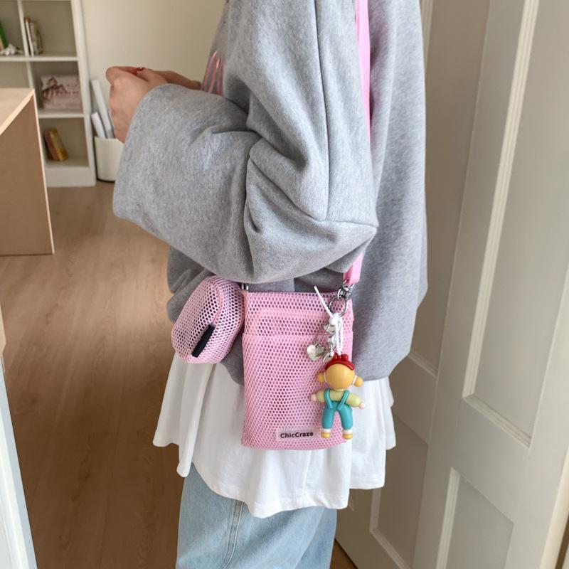 Sweet little fresh mobile phone bag women's 2025 summer new hollow shoulder bag crossbody mesh portable storage bag
