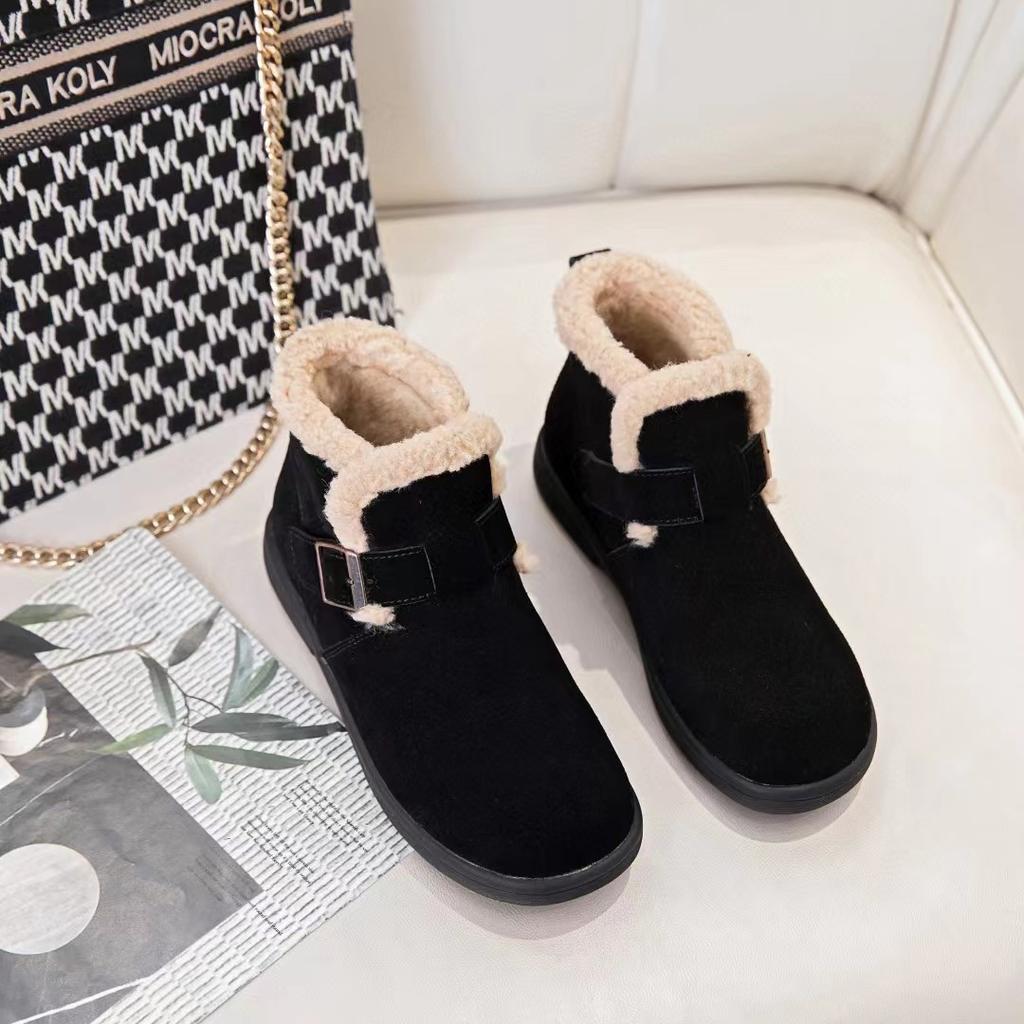 Leather snow boots women's cotton shoes autumn and winter new soft-soled piled thickened warm fluffy shoes flat short boots