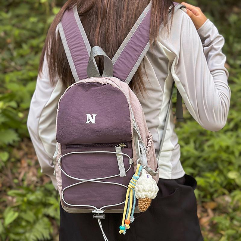 Lightweight small schoolbag for men and women commuting new large-capacity backpack for college students outdoor travel leisure backpack