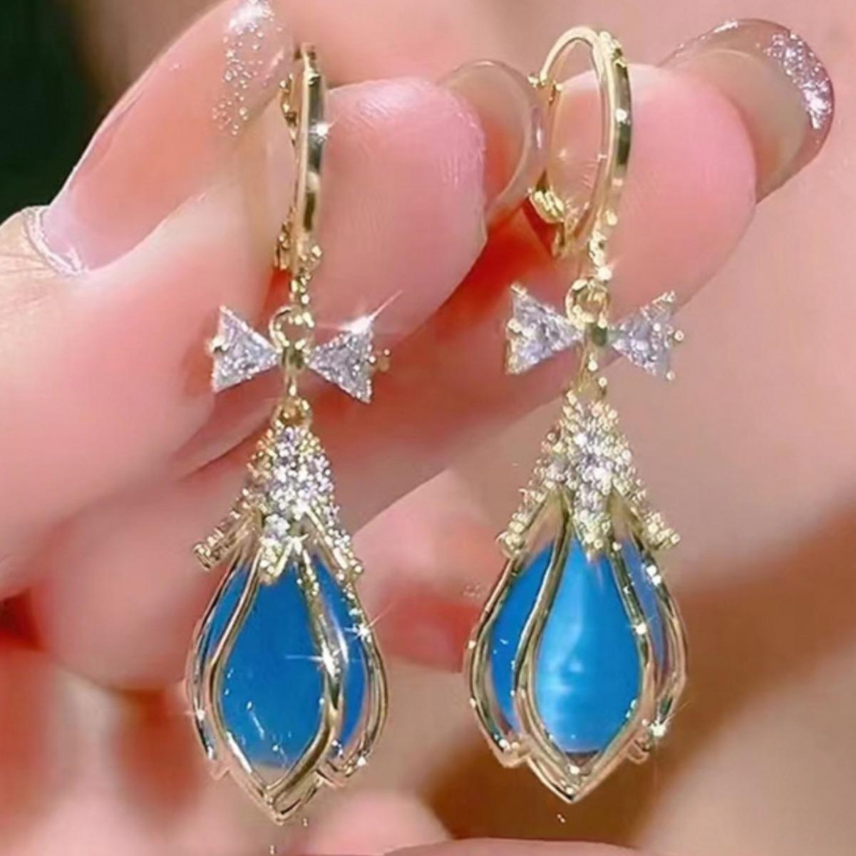 Модные серьги-подвески для женщин