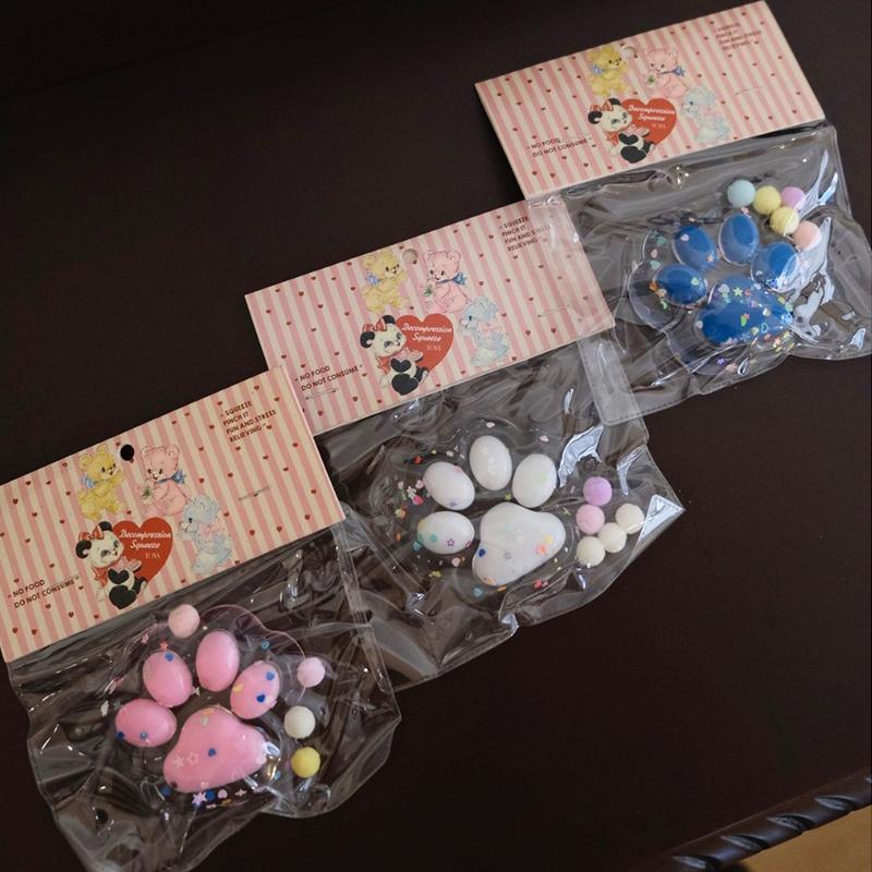 Kawaii Glitter Cat Paw Stress Relief Squeeze Toy Food Grade Soft TPR Slow Rising Toy for Kids Sensory Play Use