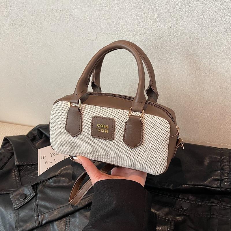 Nischen-Kontrastfarben-Bowlingtasche Damen Neu Hochwertige Canvas-Handtasche Retro Schulter-Umhängetasche