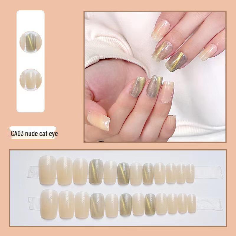 

Прозрачные золотистые кристаллы средней длины, накладные ногти «кошачий глаз»