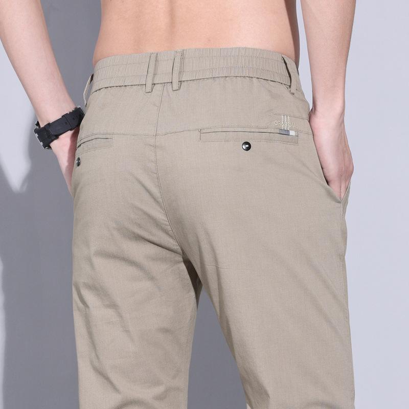 

Summer thin section of men s casual trousers loose straight elastic high-end light business men s trousers versatile trend trousers 40