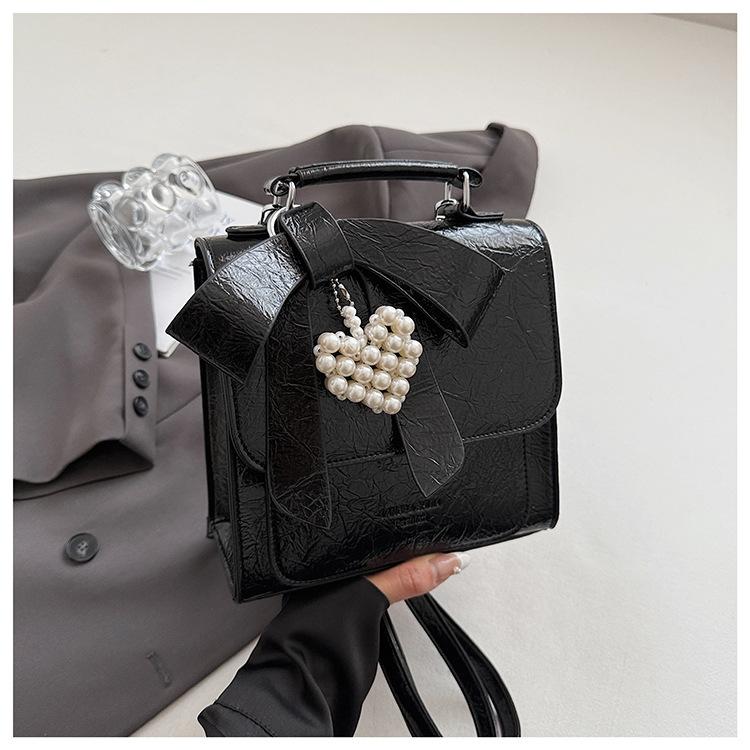 

2025 новый рюкзак чувство моды нишевый дорожный легкий школьный рюкзак женский портативный повседневный рюкзак чёрный