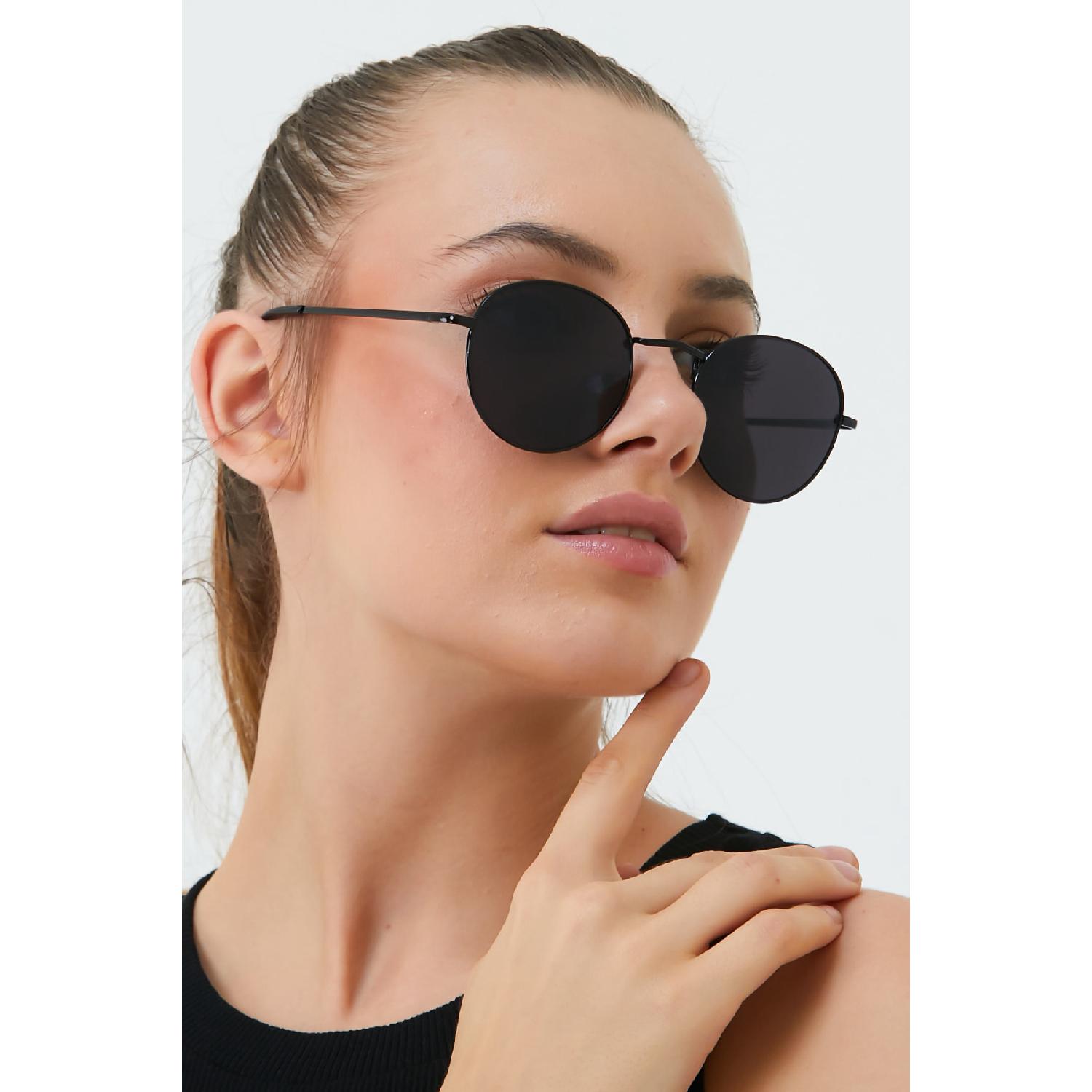 

Круглые черные солнцезащитные очки унисекс Ml 09