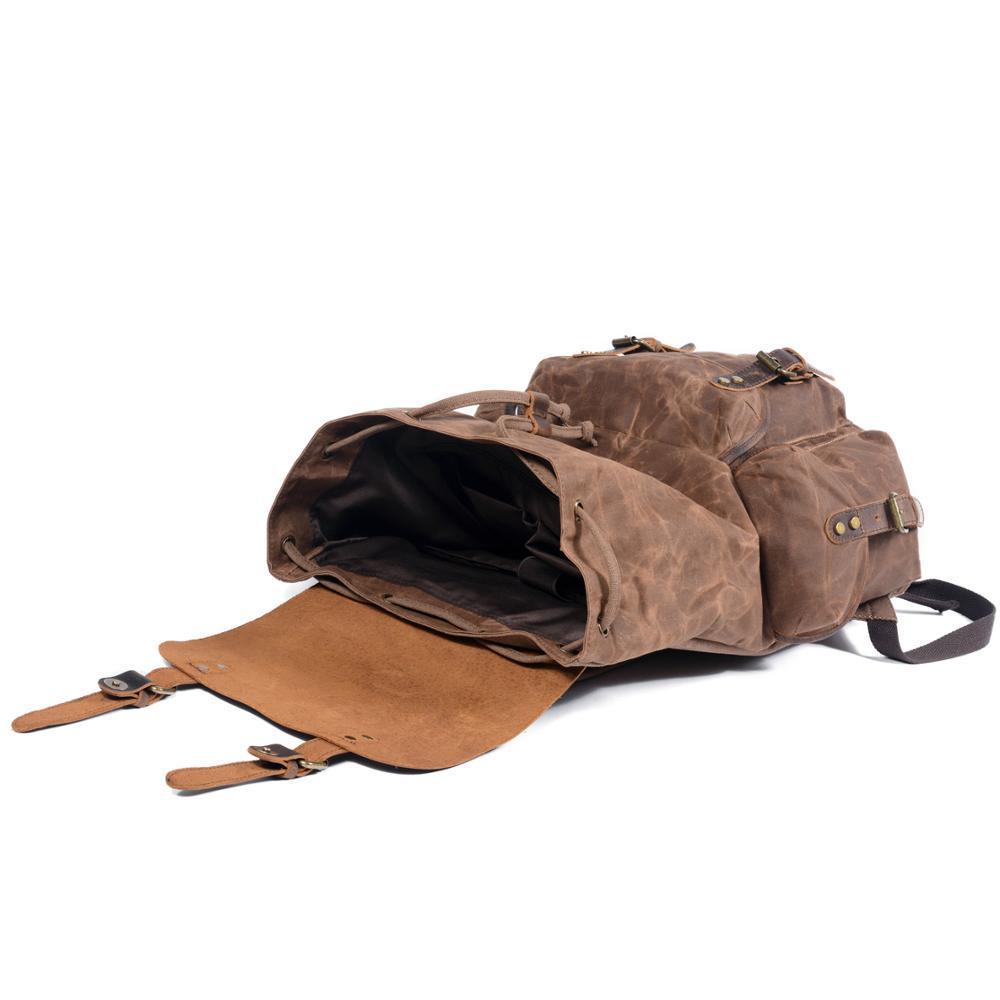 Retro Waxed Canvas Backpack - Men's Trendy Large-Capacity Shoulder Bag for Travel and Student Use.