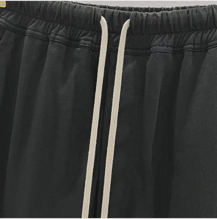 SUBHUMAN Pánská tmavá série: Slonově bílé zkrácené harémové pletené kalhoty - Letní ležérní móda