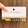 Boucles d'Oreilles Créoles Lisses Torsadées - Design Rétro, Finition Haut de Gamme, Style Niche Riz Sept Grains