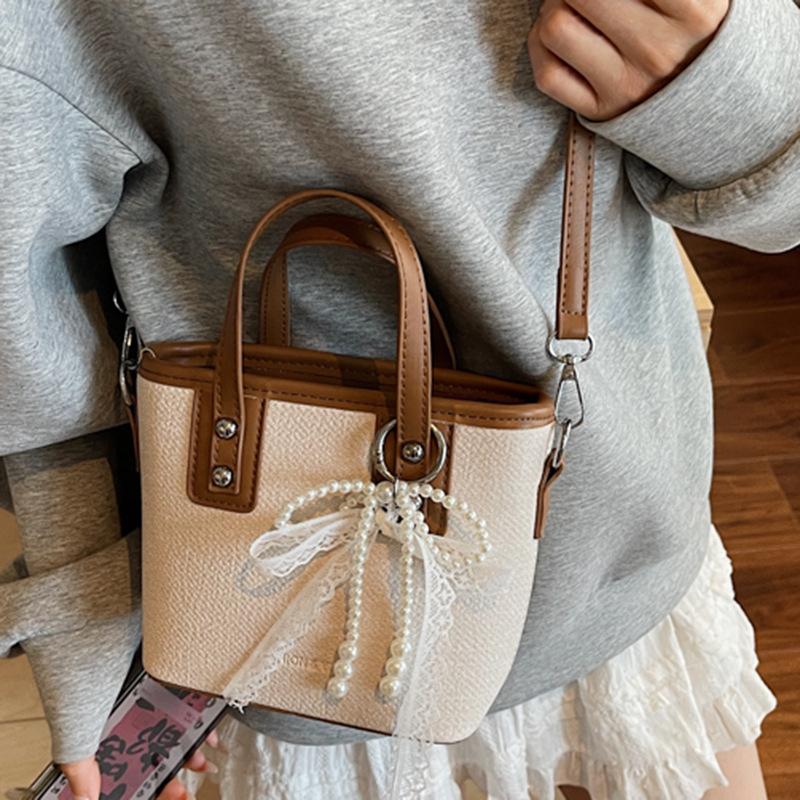 2025 New Textured Small Bag Female Senmeng Summer Popular Shoulder Messenger Bag Fashionable Contrasting Color Portable Bucket Bag
