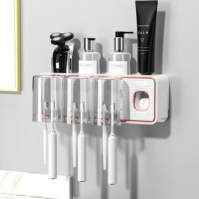 Wandmontiertes Zahnbürstenhalter-Set mit automatischem Zahnpastaspender